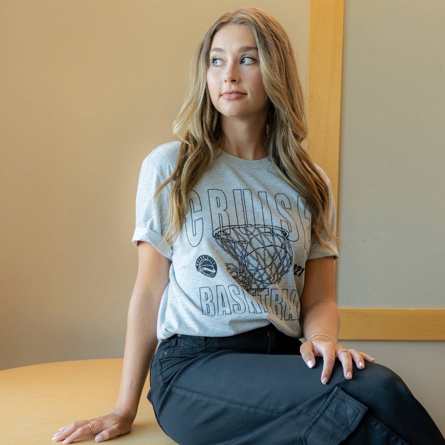 Student Wearting Nike Detroit Motor City Cruise Net Swish T-Shirt in Grey - Front View