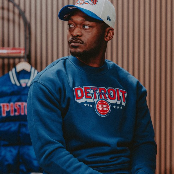 Model Wearing Detroit Pistons Applique Wordmark Crewneck Sweatshirt