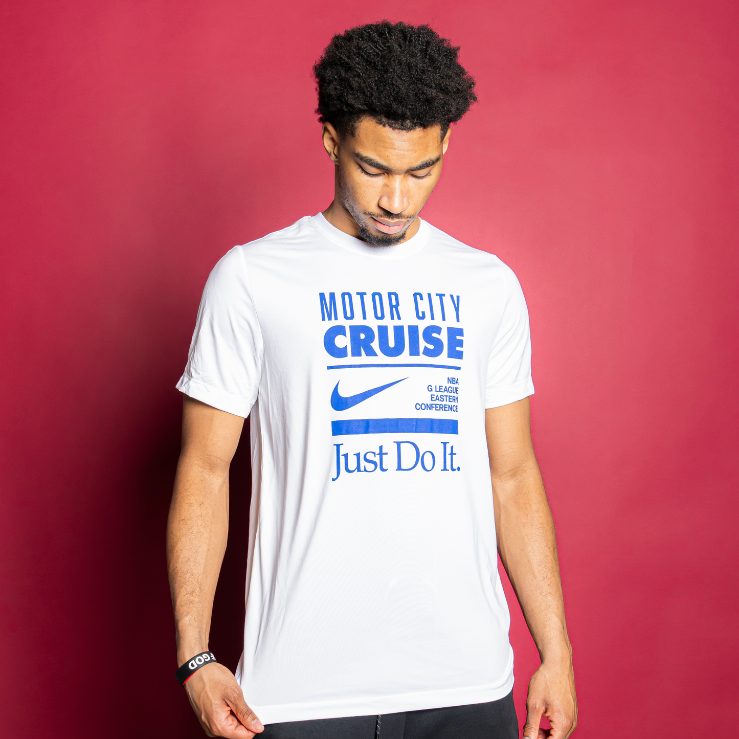 Model Wears Motor City Cruise Nike Globe Dri-Fit T-Shirt in White - Front View