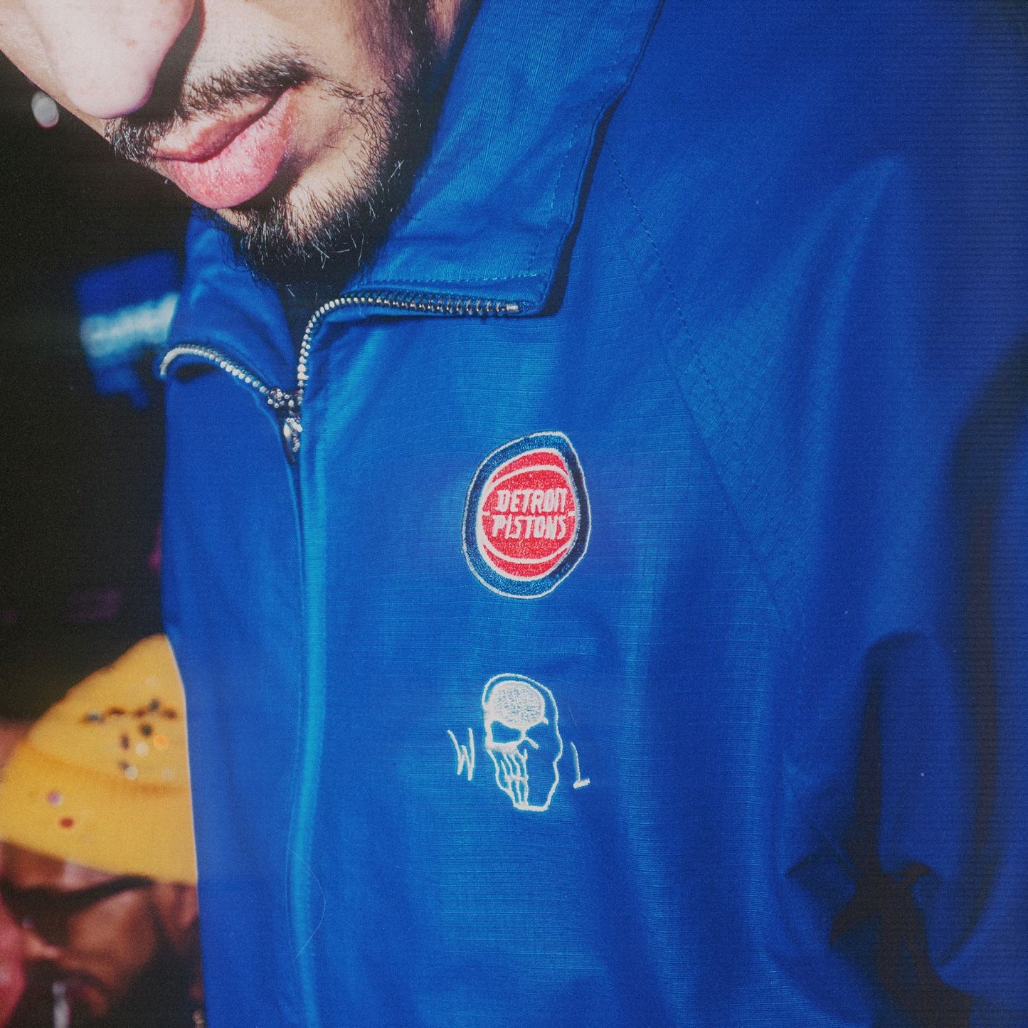 Model Wearing Warren Lotas x Detroit Pistons Barbed Wire Full Zip Jacket