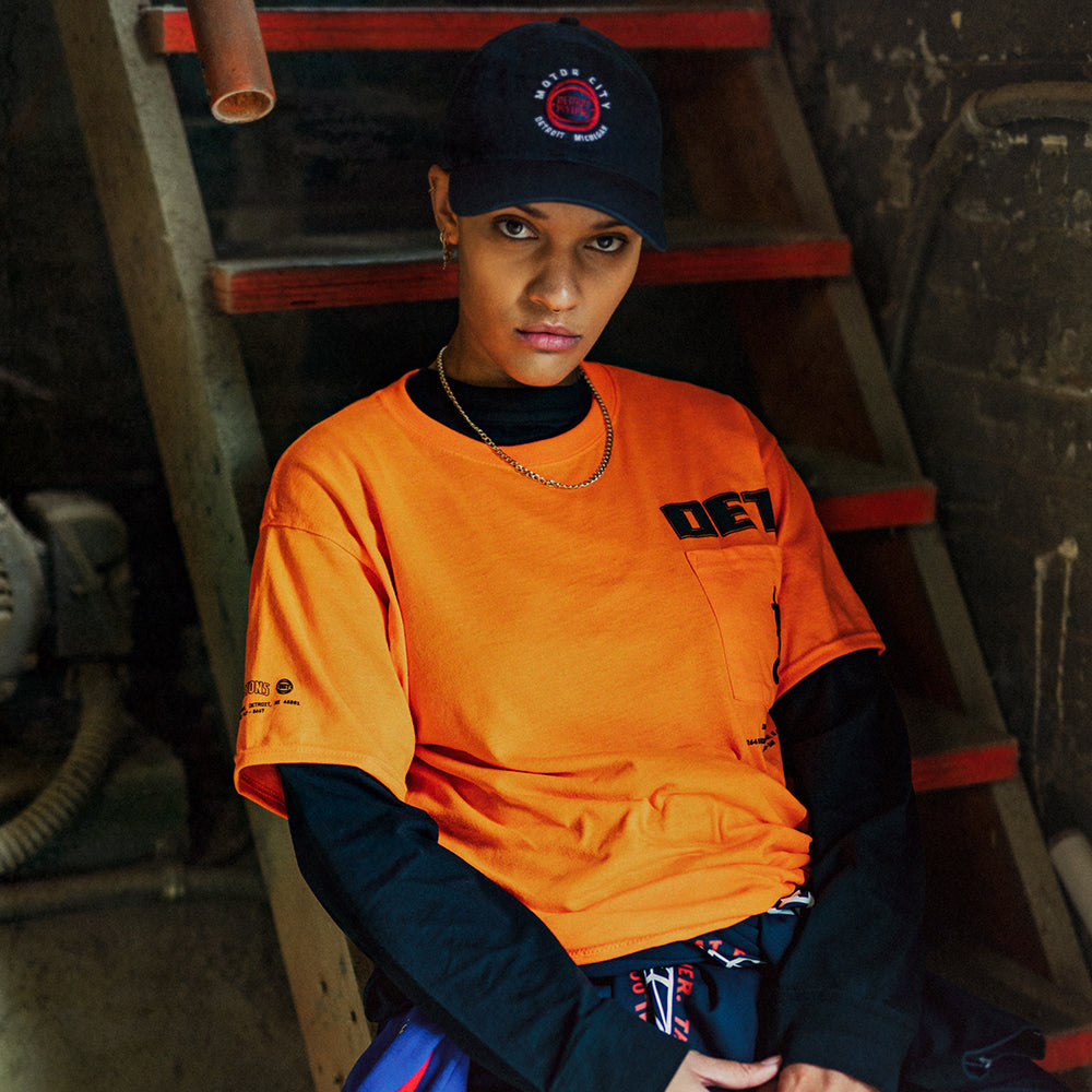 DETail Threads Pistons Garage Power T-Shirt in Orange - Front View, Worn