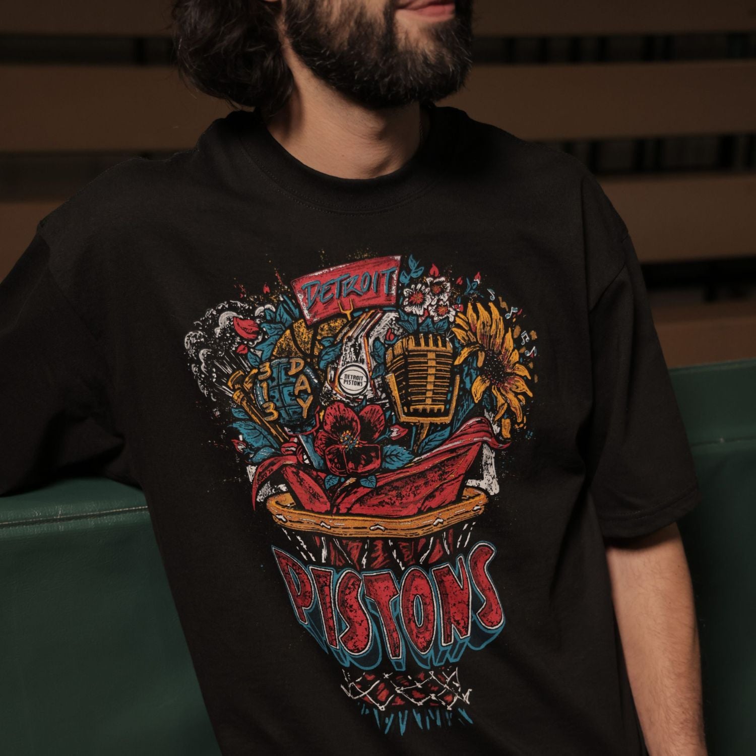 Model wearing Pistons Detroit Basketball Bouquet Tee By 'JKo Studios' in black - Front View