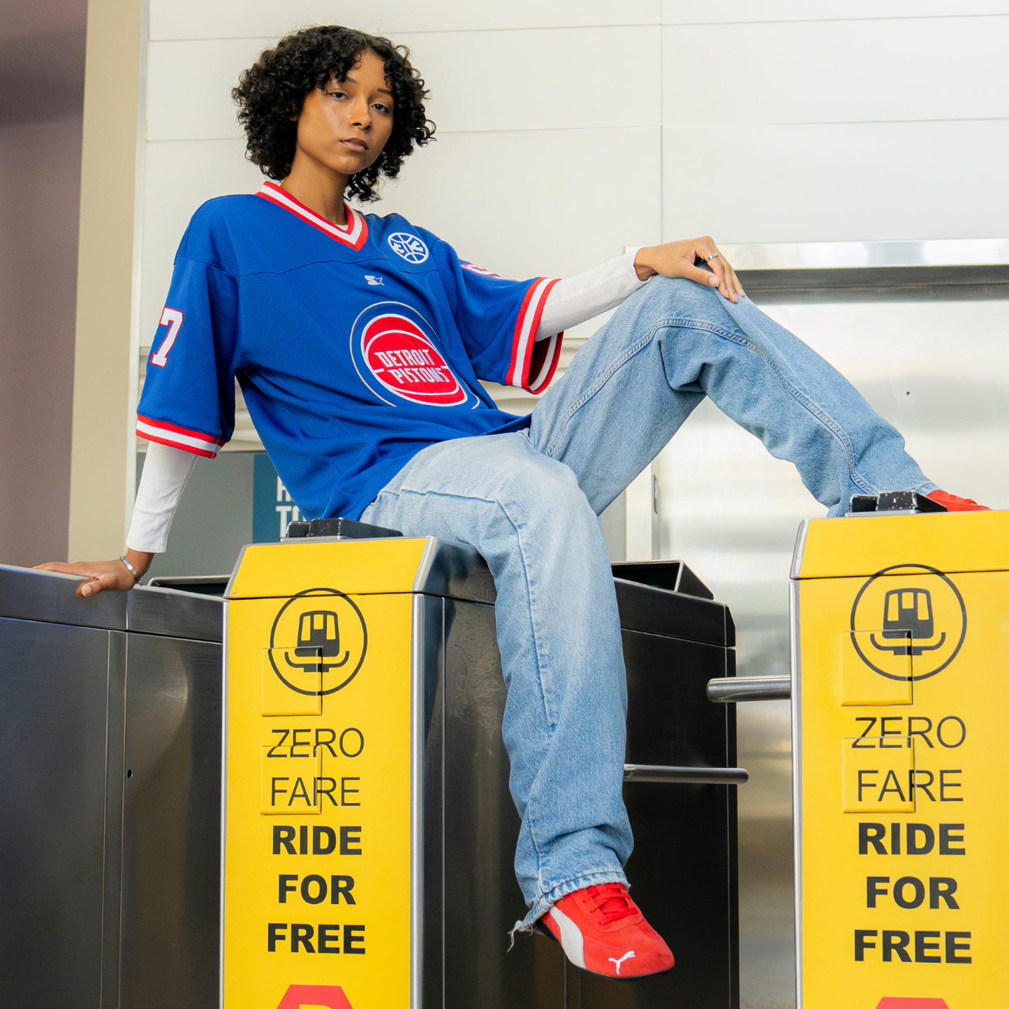Model Wearing Detroit Pistons Starter Football Jersey in Blue - Front View