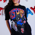 Model wearing Detroit Pistons x Kiwiclo Hooper's Birthday Dunk T-Shirt in Black - Front View