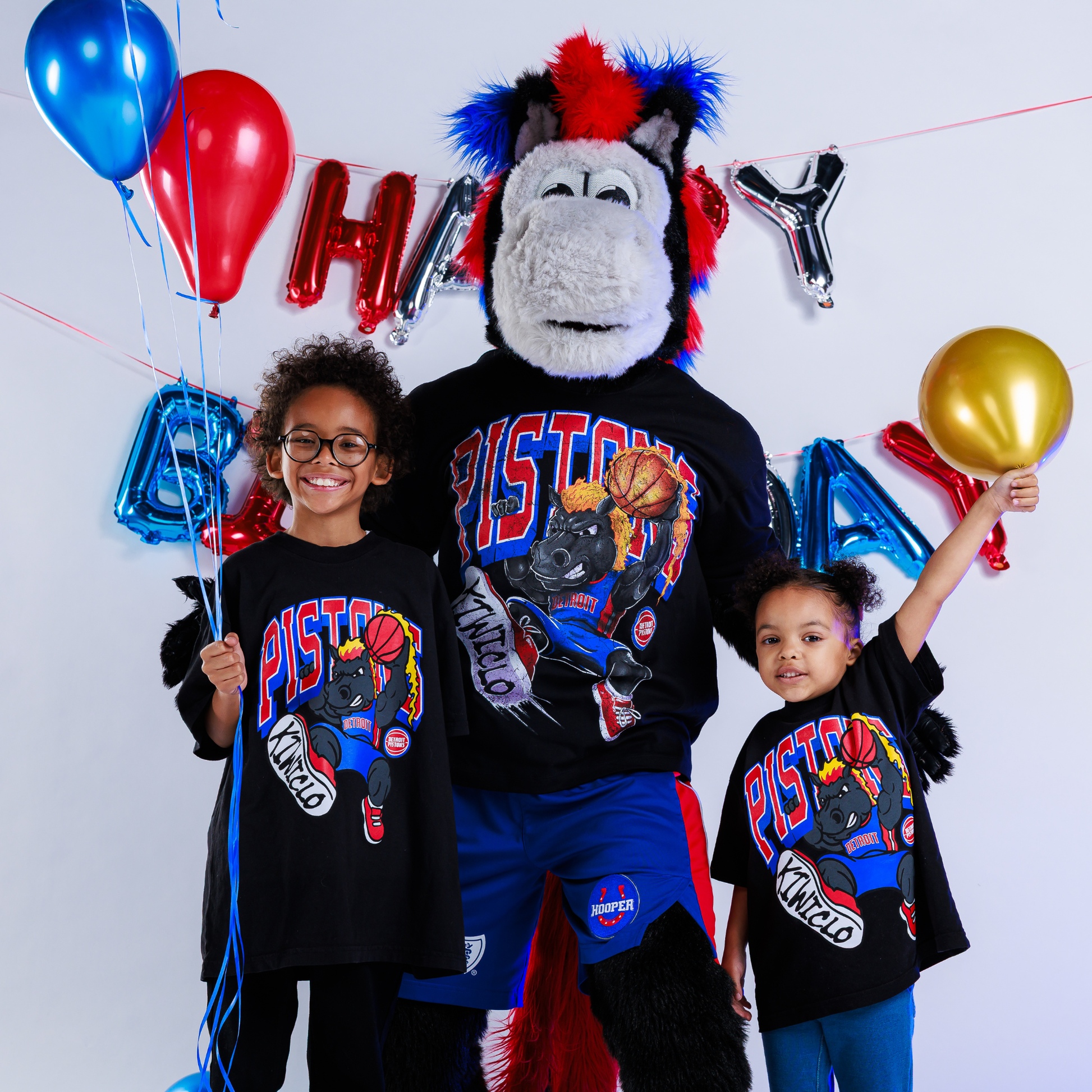 Children wearing Youth Detroit Pistons x Kiwiclo Hooper's Birthday Dunk T-Shirt in Black - Front View