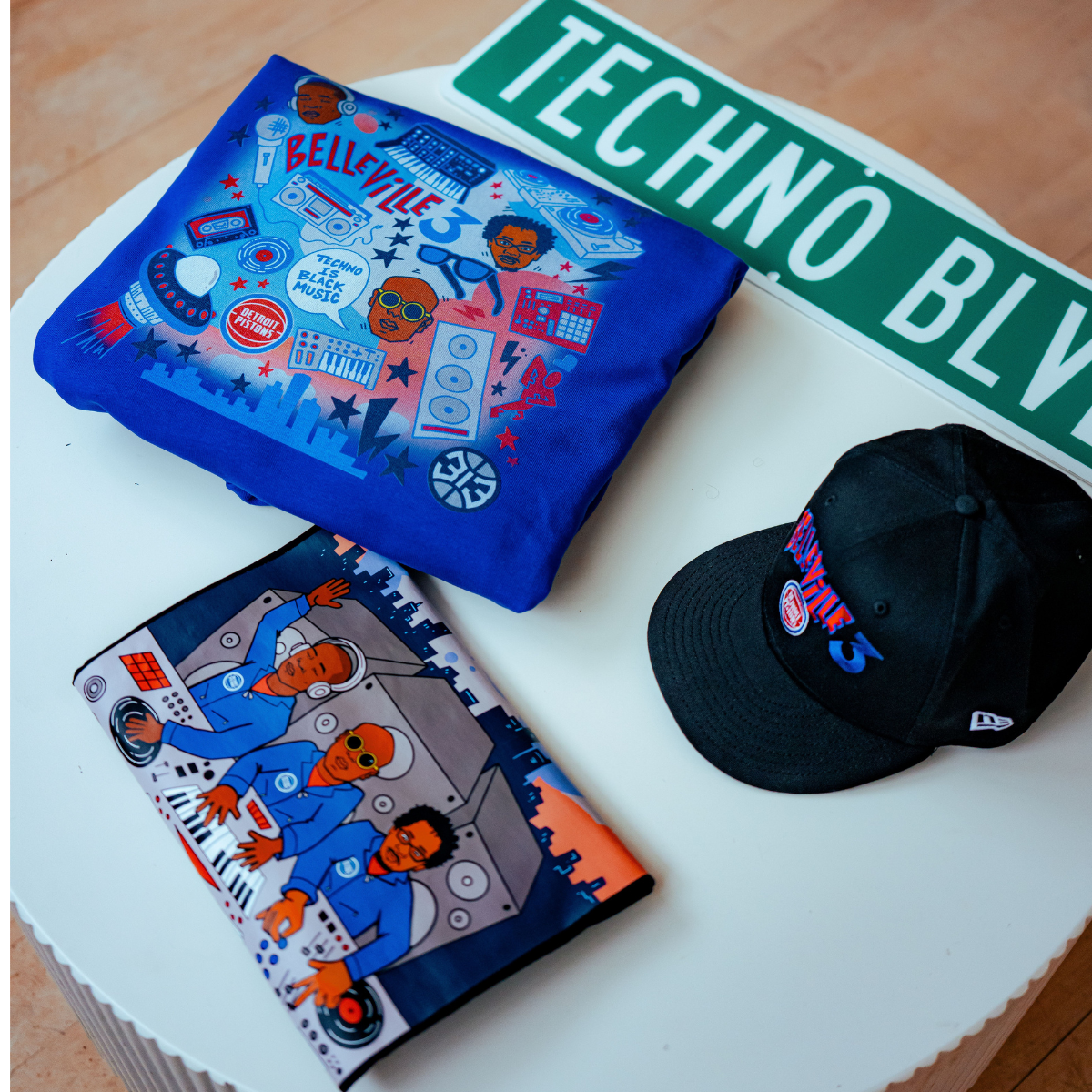 Blue and black items with artistic designs on a white surface