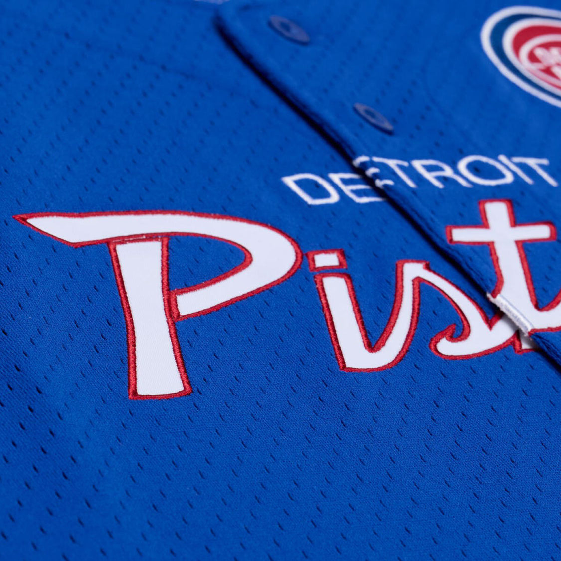 Detroit Pistons Mitchell & Ness Head Coach Baseball Jersey in Blue - Front Detail View 